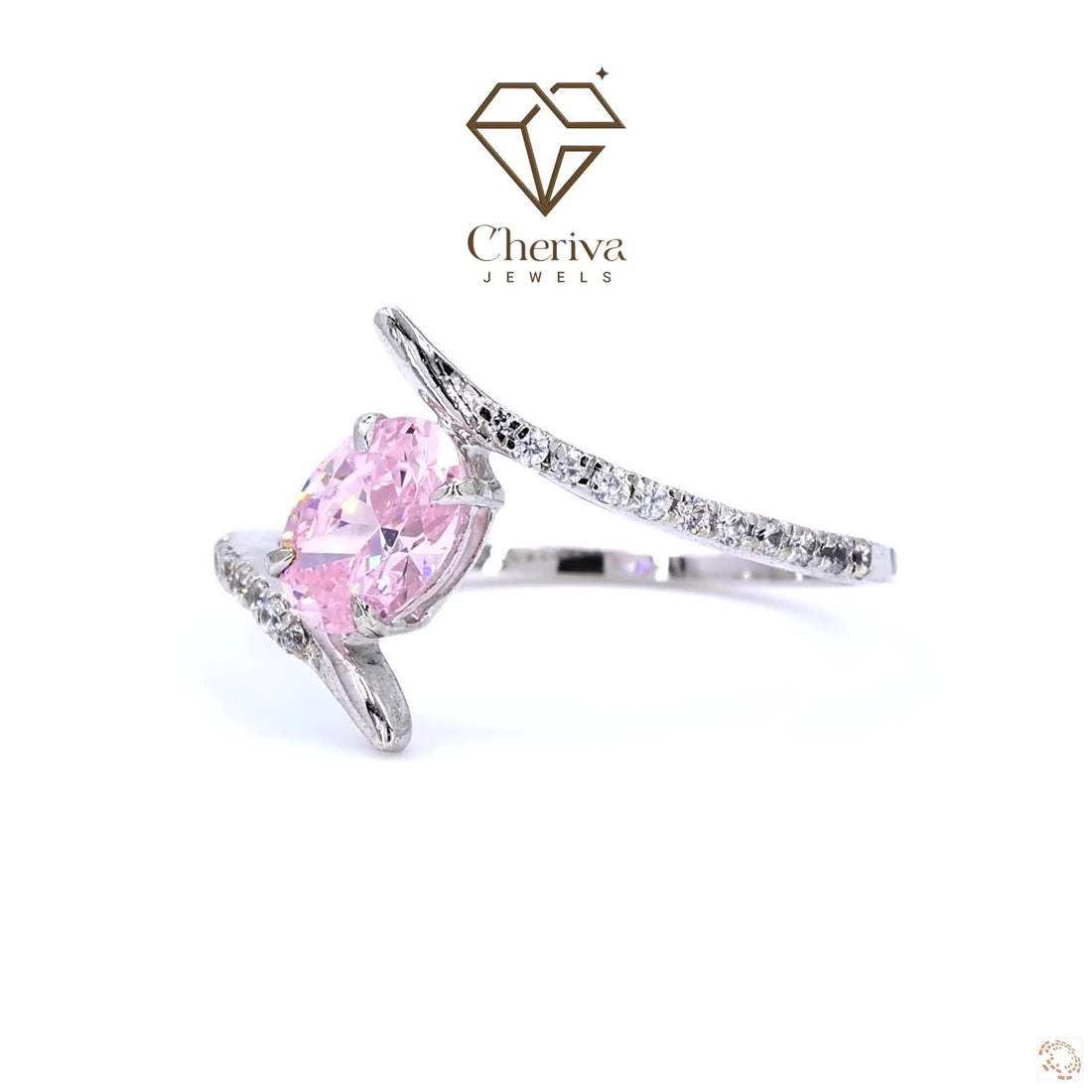 Silver ring with a pink gemstone on a white background, featuring the Cheriva Jewels logo.