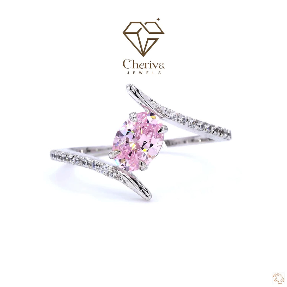 Silver ring with a pink gemstone on a white background, featuring the Cheriva Jewels logo.
