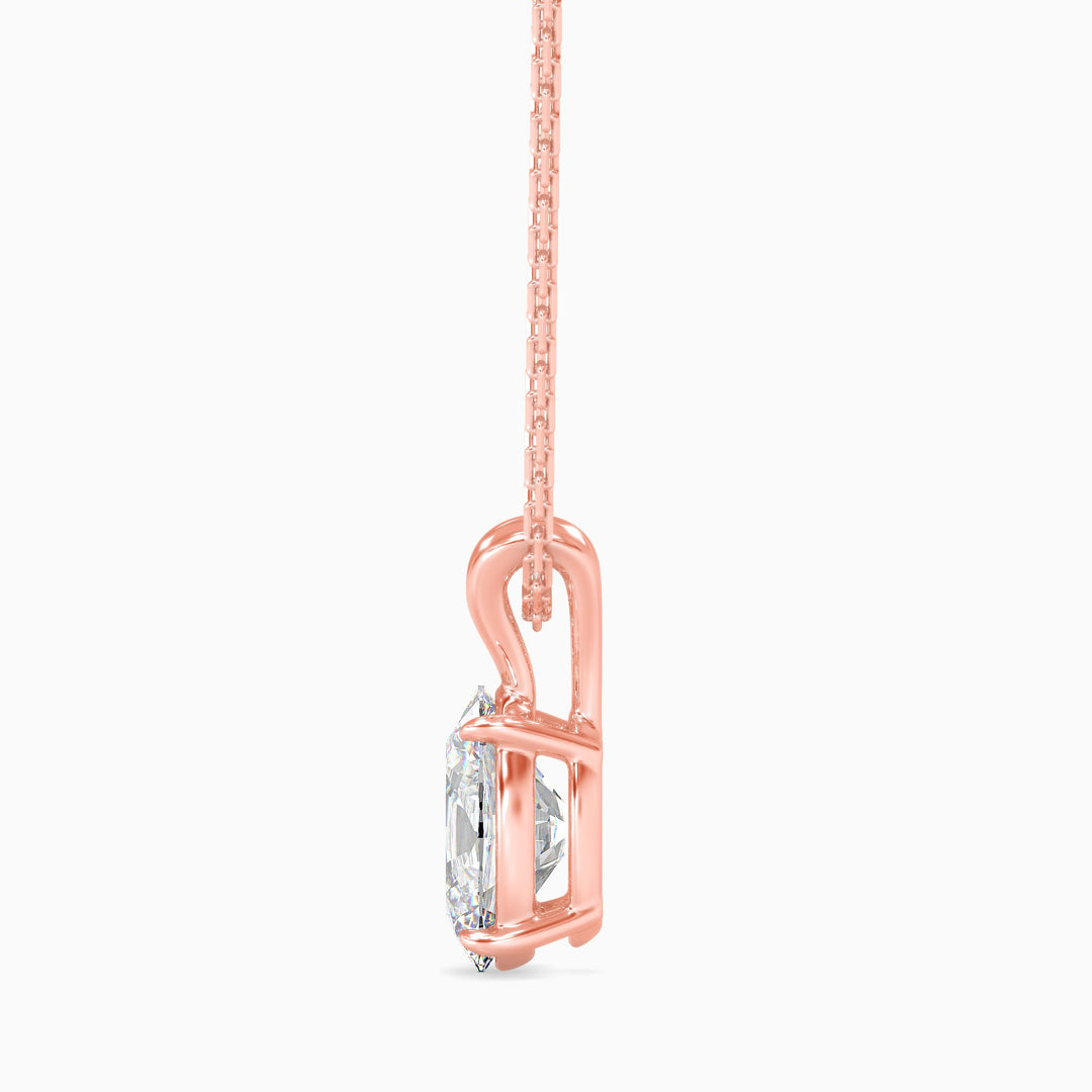 Rose gold necklace with a diamond pendant on a white background