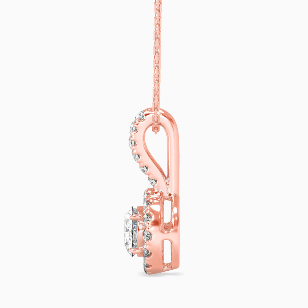 Rose gold necklace with a heart-shaped pendant on a white background