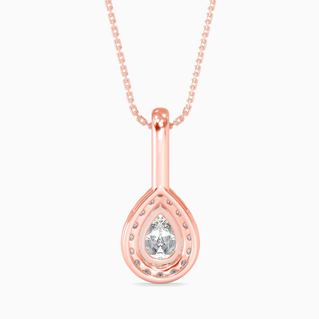 Rose gold teardrop pendant necklace on a white background