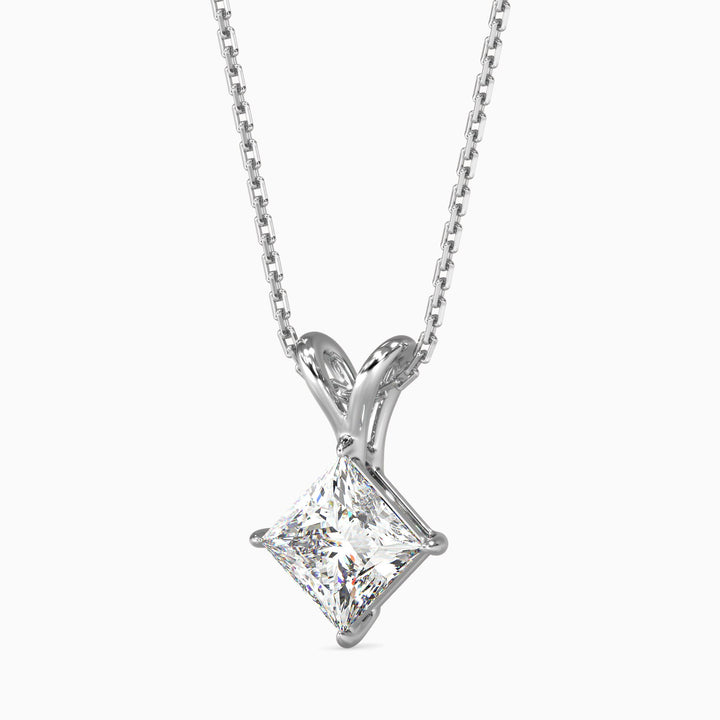 Diamond pendant necklace on a white background
