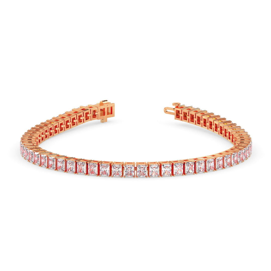 Rose gold bracelet with clear gemstones on a white background