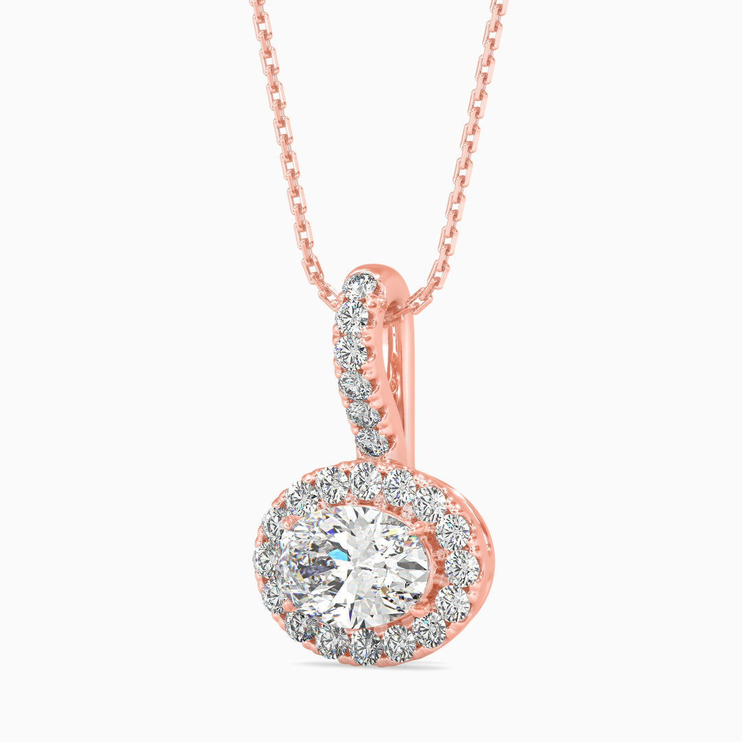 Rose gold diamond pendant on a white background