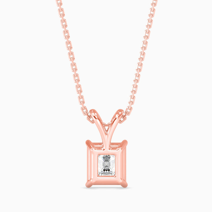 Rose gold necklace with a diamond pendant on a white background