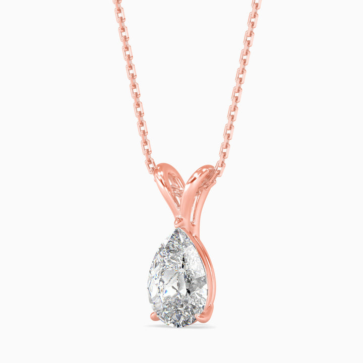 Rose gold necklace with a teardrop-shaped diamond pendant on a white background