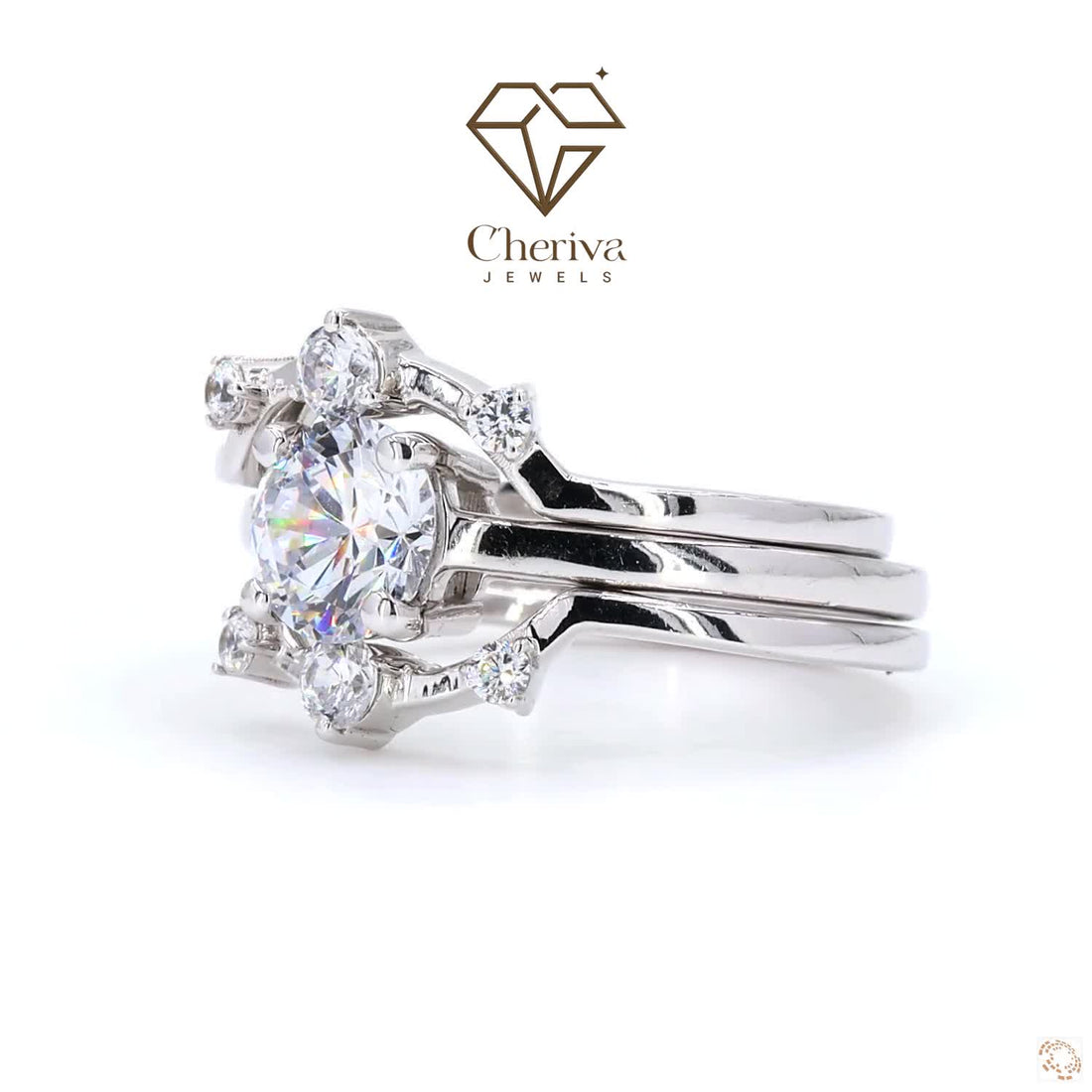 Set of silver rings with a prominent diamond on a white background, featuring the Cheriva Jewels logo.