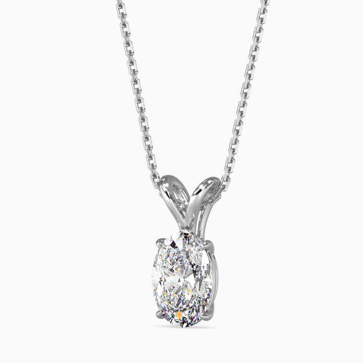 Diamond pendant on a chain against a white background