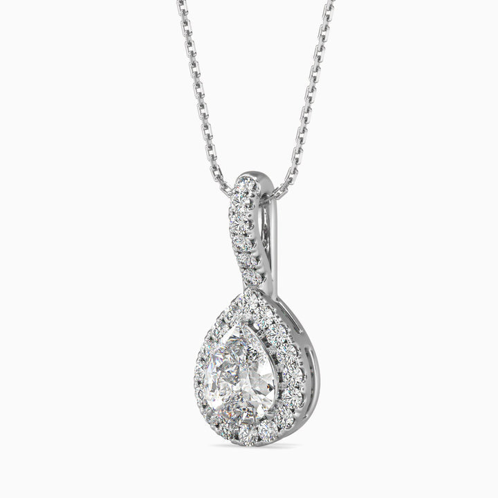 Diamond teardrop pendant on a chain against a white background