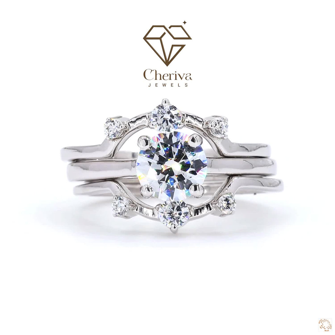 Silver ring with a large central gemstone and smaller diamonds on a white background, featuring the Cheriva Jewels logo.