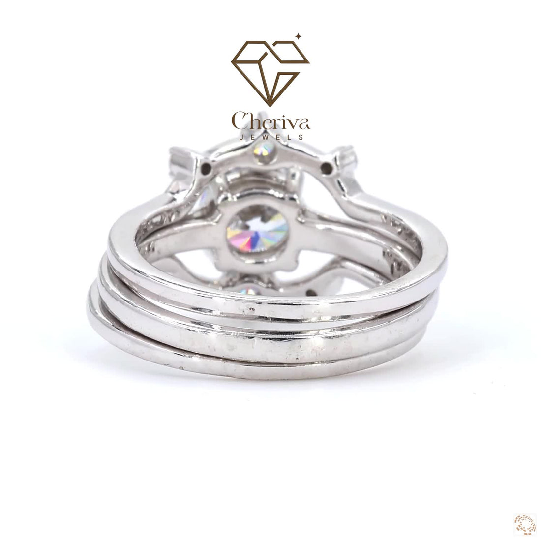 Silver ring with a gemstone on a white background, featuring the Cheriva Jewels logo.