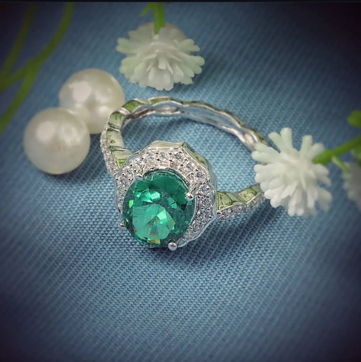 Green Gemstone Halo Engagement Ring