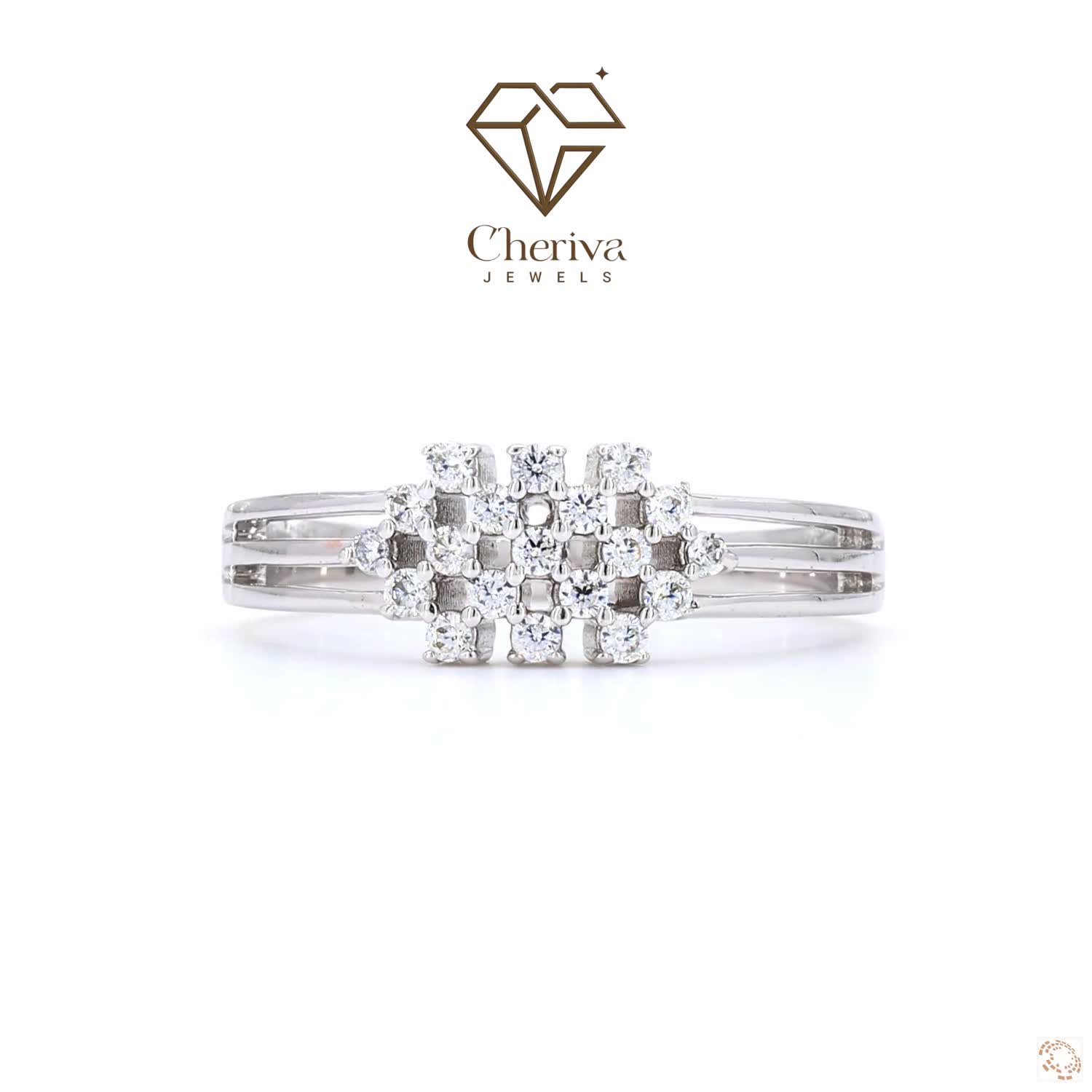White gold engagement ring with a central lab-grown diamond surrounded by a sparkling halo setting
