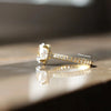 solid gold, hidden halo oval engagement ring.