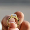 gift for anniversary with emerald cut engagement ring.