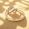 emerald cut diamond engagement ring in solid gold.