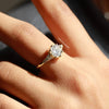 solid gold with round brilliant cut diamond ring.