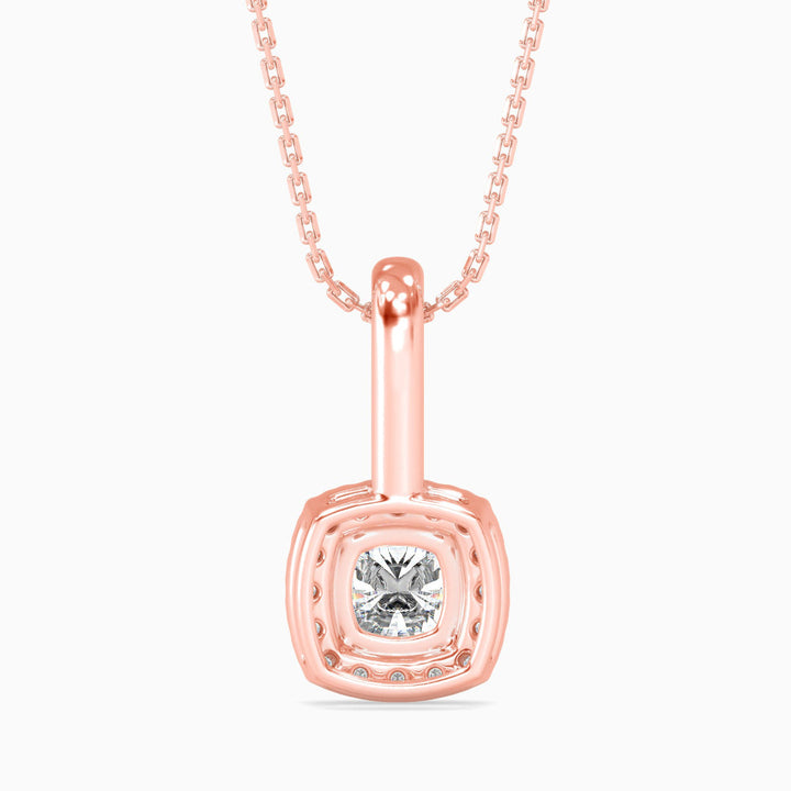 Rose gold necklace with a diamond pendant on a white background