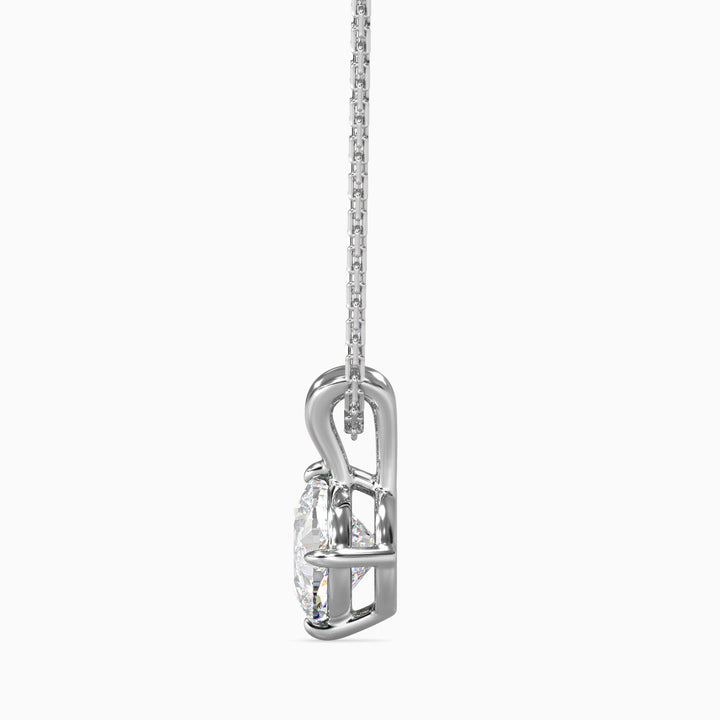 Silver necklace with a unique pendant on a white background