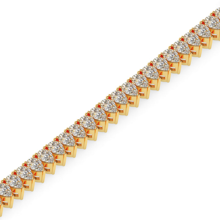 Gold bracelet with clear diamond on a white background