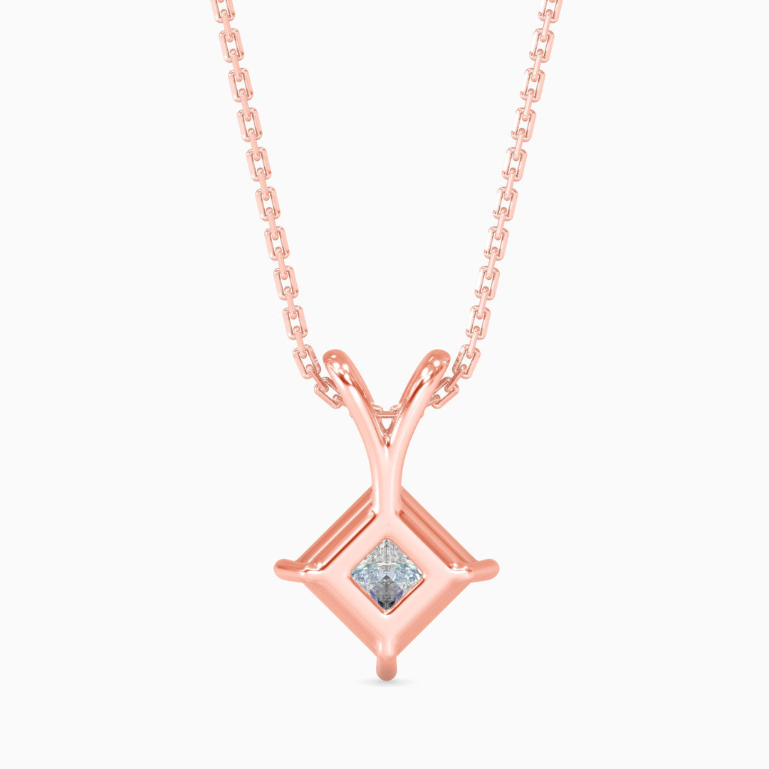 Rose gold necklace with a diamond pendant on a white background