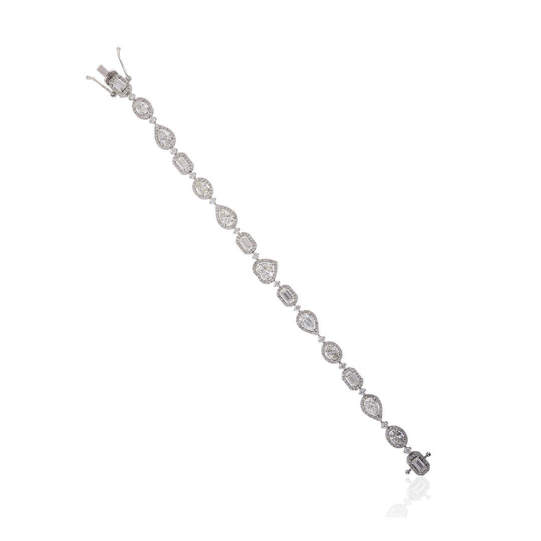 Silver bracelet with clear stones on a white background