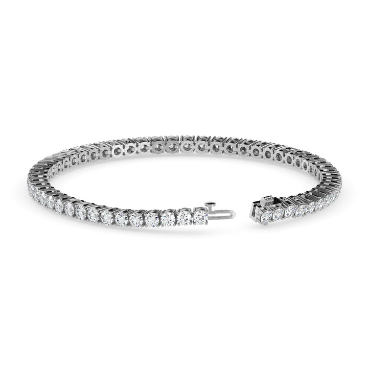 Silver tennis bracelet set with lab-grown diamonds in a classic line design on a white background